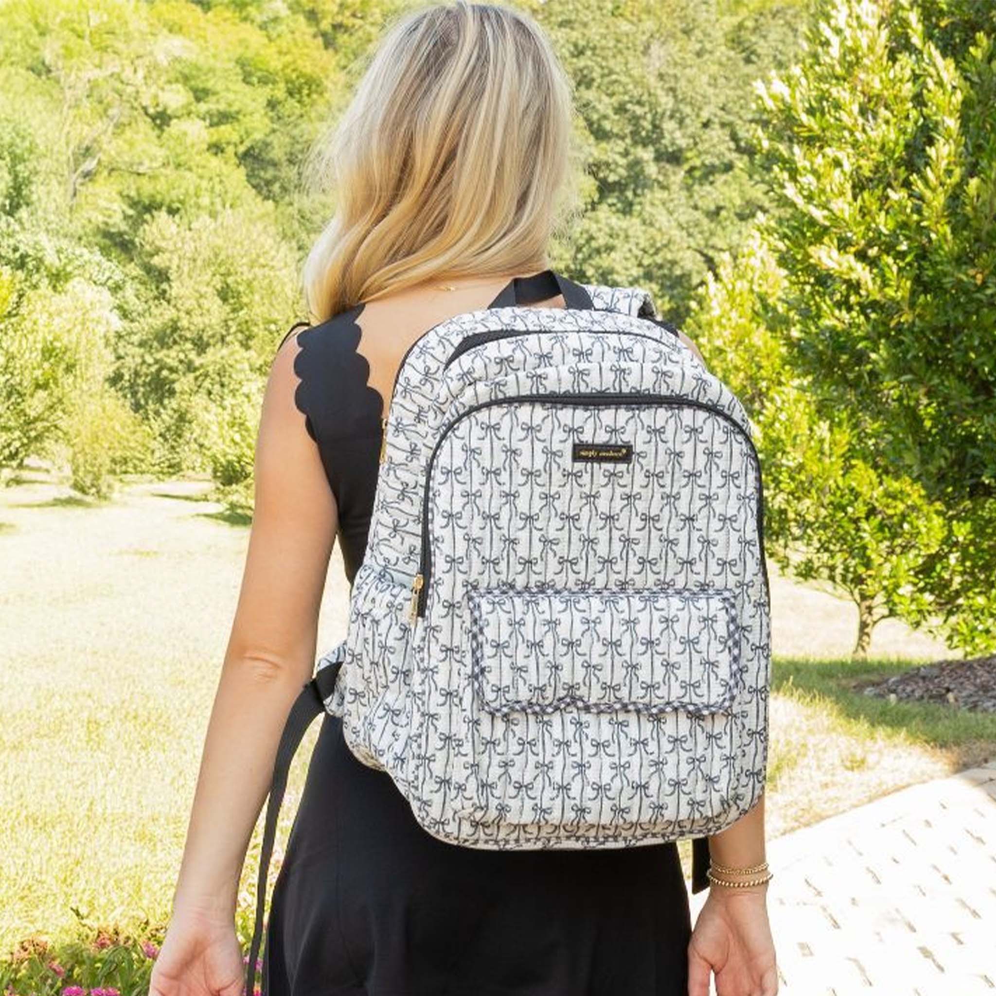 Quilted Bow Backpack in Black and Cream - Image 3